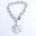 A brand new Tiffany & Co sterling silver Notes disc charm bracelet, bracelet length 18cm, 40.5g,
