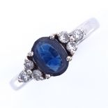 A 14ct white gold sapphire and diamond dress ring, sapphire length 7mm, size L, 3.2g Good original