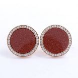 A modern pair of 18ct rose gold gold stone and diamond cluster panel cufflinks, total diamond