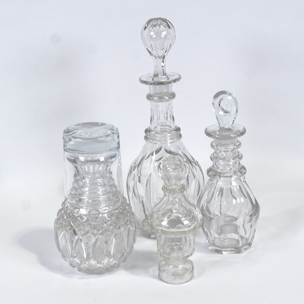 Two Victorian decanters, a water / whisky carafe and pepper, tallest 28cm. (4) Replacement "Famous