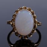 A late 20th century 9ct gold cabochon opal dress ring, setting height 17.7mm, size O, 3.4g Very good