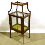 An Edwardian mahogany centre standing display cabinet with shelf above, 50cm x 38cm
