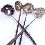 A large quantity of silver and silver plated toddy ladles and sifter spoon, including models with