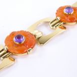A French Art Deco style carnelian and amethyst bracelet, geometric form with carved and pierced