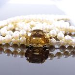 A Vintage double-strand cultured pearl necklace, pearls measuring 5.6mm on unmarked gold citrine