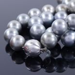 A single-row grey cultured South Sea pearl and diamond necklace, comprising a graduated row of 33