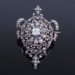 An Antique gold silver and diamond stomacher pendant/brooch, 19th century, tiered settings with old,