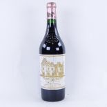 A bottle of red Bordeaux wine, 2000 Chateau Haut-Brion, First Growth 1er Grand Cru Classe...