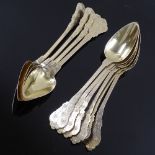 A set of 10 19th century French silver-gilt teaspoons, bright-cut engraved floral decorated