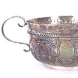 A Victorian silver 2-handled 3-pint punch bowl, formed as a 17th century porringer, half-fluted