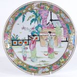 A Chinese porcelain plate with painted enamel figures, diameter 31cm