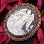A 19th century relief carved shell cameo panel pendant/brooch, depicting angel playing a lute, in