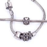 A Pandora sterling silver charm bracelet, length 19cm, another similar silver charm bracelet, length