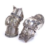 A modern Gothic style sterling silver knight's leg armour design finger ornament, size approx S, and