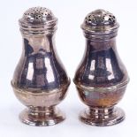 2 George II silver baluster bun-top muffineer/pepper pots, hallmarks London 1741 and 1750, largest