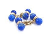 A modern pair of unmarked yellow metal lapis lazuli dumbbell cufflinks, length 18.9mm, 11.5g Good