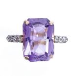 An 18ct gold amethyst and diamond dress ring, with platinum-top settings, amethyst length 14mm, size