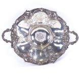 A large Victorian silver 2-handled table centre fruit bowl, with cast foliate border, engraved