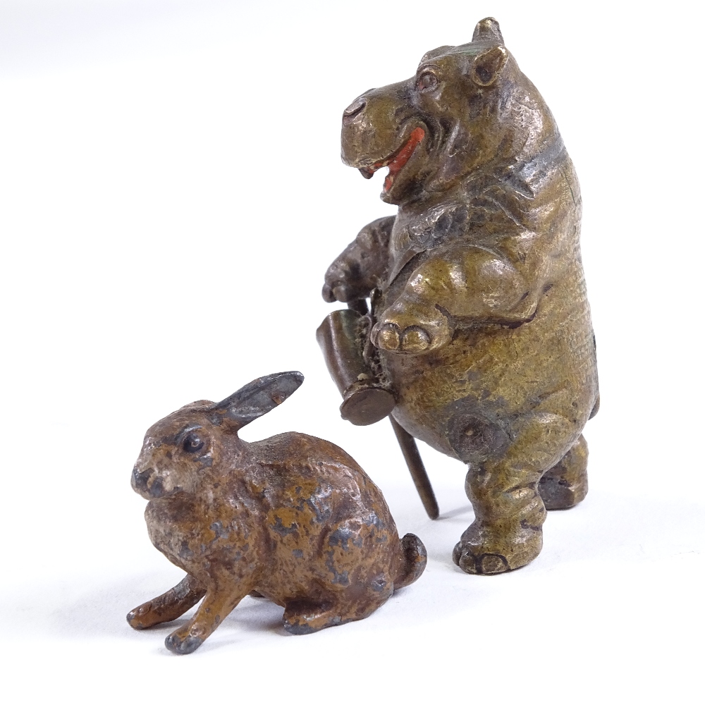 A miniature cold painted bronze caricature hippo with a walking stick, unsigned, height 5cm, and a - Image 2 of 3