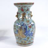A 19th century Chinese celadon glaze porcelain vase, with painted enamel birds flowers and