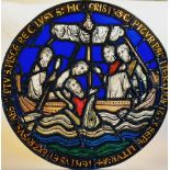 A stained glass panel, copy of 13th century window in Canterbury Cathedral depicting Jonah and the