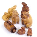 A group of Japanese carved wood netsuke, including a rat holding his tail, height 5cm https://