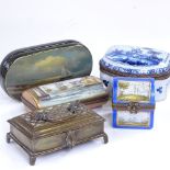 A group of enamel porcelain and metal boxes, including a porcelain dome-top box containing perfume