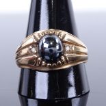 A large 9ct gold cabochon haematite and paste signet ring, setting height 13.1mm, size X, 6.9g