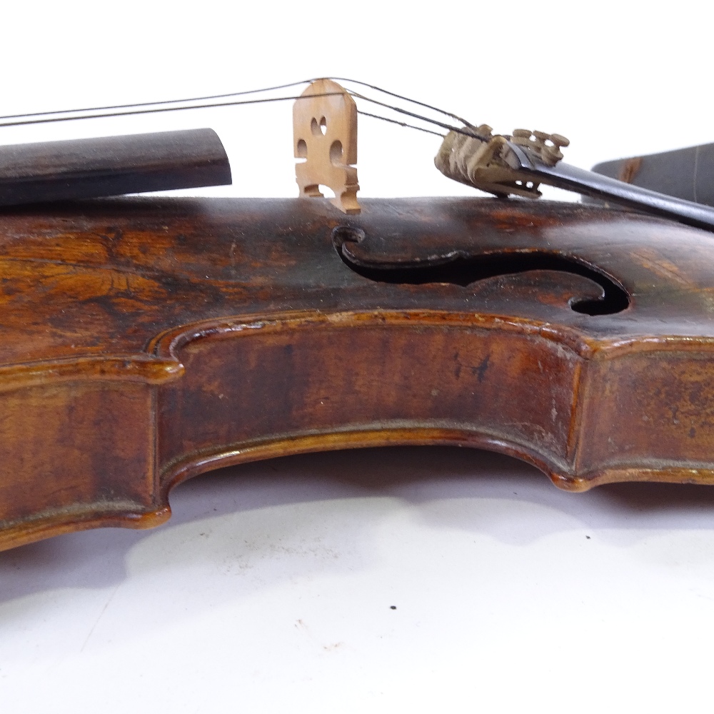 An 18th century violin, indistinct label with date 1703/09?, back length 35cm, with bow and case - Image 14 of 15