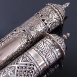 2 Eastern unmarked white metal scroll holders, allover pierced and engraved foliate decoration,