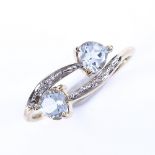A modern 10ct gold blue topaz double-heart dress ring, setting height 7.6mm, size S, 2.1g Very