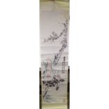 A Chinese scroll painting with text and seals