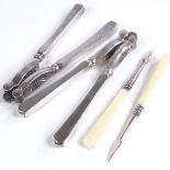 Cased silver plated nutcrackers and nut picks, with ivory handles Very good condition
