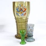 A large Continental amber glass vase with painted enamel armorial crest and applied twist