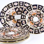 A set of 6 Royal Crown Derby Imari pattern plates, diameter 27cm, and a matching meat plate,