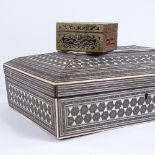 A small 19th century French Boulle marquetry inlaid box, 9cm across, and an Indian Vizagapatam ivory