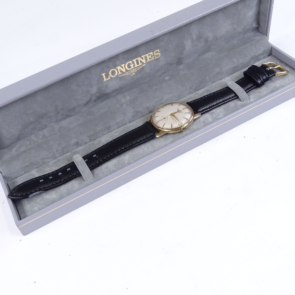 LONGINES - a Vintage 9ct gold mechanical wristwatch, silvered dial with gilt quarterly Arabic - Image 5 of 5