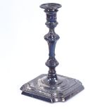 An Edwardian silver taperstick, in George I style with removable sconce, by Goldsmiths &