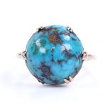 An early 20th century 9ct gold cabochon turquoise matrix ring, setting height 13.6mm, turquoise
