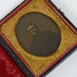 A 19th century American Civil War tin-type photograph, portrait of a soldier in an embossed Stars