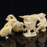 A group of 19th century ivory carvings, including a crouching monkey, height 5cm, and various birds