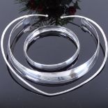 2 Danish silver neck torques and a similar plain form bangle, internal lengths 125mm and 110mm,
