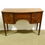 A 19th century mahogany bow-front kneehole sideboard, width 125cm