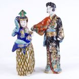 2 Japanese porcelain figures of theatre actors, largest height 33cm (A/F)