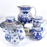 A collection of 18th century English blue and white china, including sparrow-beak jugs, a pint