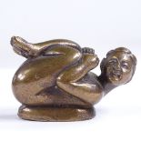 A Japanese erotic bronze crouching figure, length 5.5cm