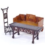 3 pieces of miniature Chinese hardwood furniture, including a panelled settle, width 24cm, altar