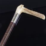 A Victorian horn-handled woven leather riding crop Good condition.