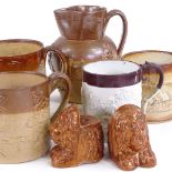 A group of 19th century salt glazed stoneware, mugs, jug and lion design furniture mounts (7)