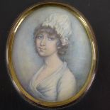 A 19th century miniature watercolour on ivory, portrait of a woman in ebonised frame, overall